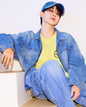 A man wearing a denim outfit by ACMÉ DE LA VIE