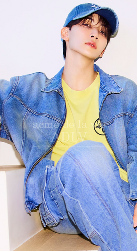 A man wearing a denim outfit by ACMÉ DE LA VIE