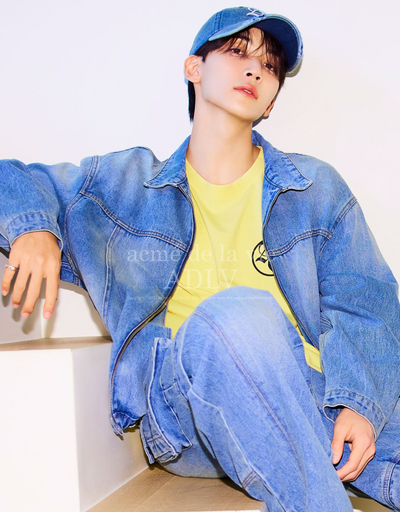 A man wearing a denim outfit by ACMÉ DE LA VIE