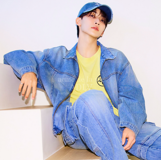 A man wearing a denim outfit by ACMÉ DE LA VIE