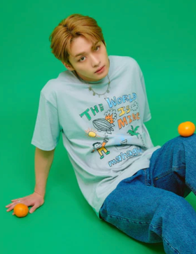 A man wearing a blue cartoon shirt by Mahagrid