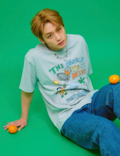 A man wearing a blue cartoon shirt by Mahagrid