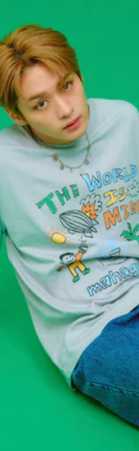 A man wearing a blue cartoon shirt by Mahagrid
