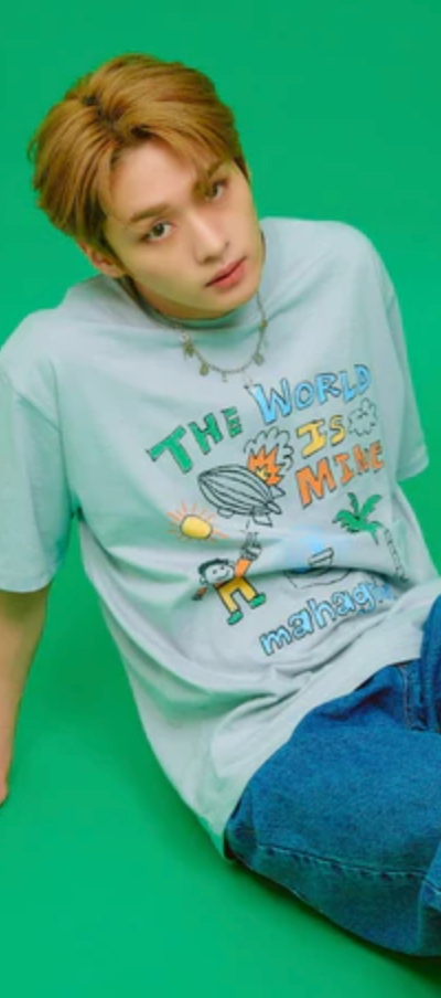 A man wearing a blue cartoon shirt by Mahagrid