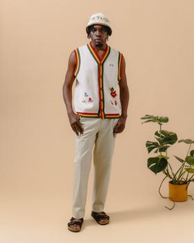A man wearing a floral vest by The New Originals Amsterdam