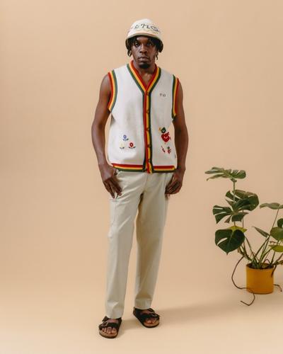 A man wearing a floral vest by The New Originals Amsterdam