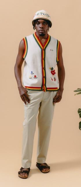 A man wearing a floral vest by The New Originals Amsterdam