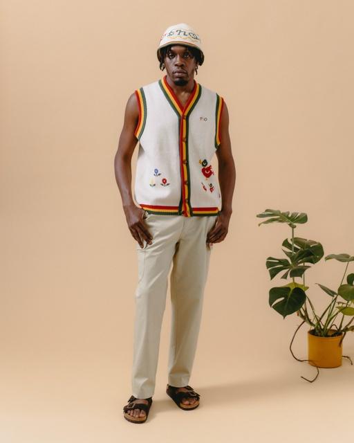 A man wearing a floral vest by The New Originals Amsterdam