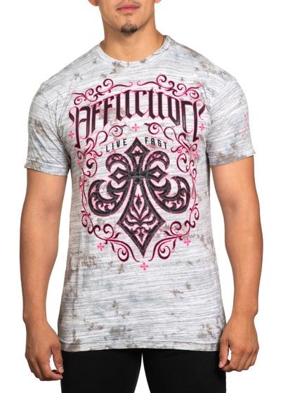 A man wearing an affliction t-shirt in pink and grey