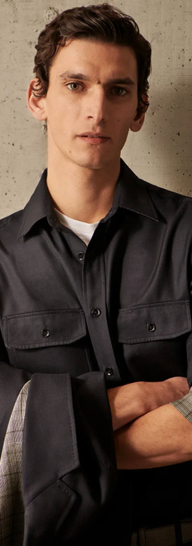 A man wearing a Brioni button up