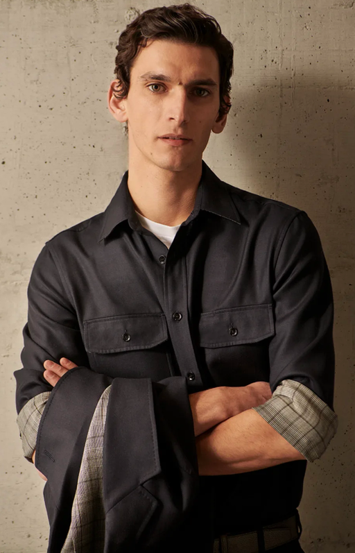 A man wearing a Brioni button up
