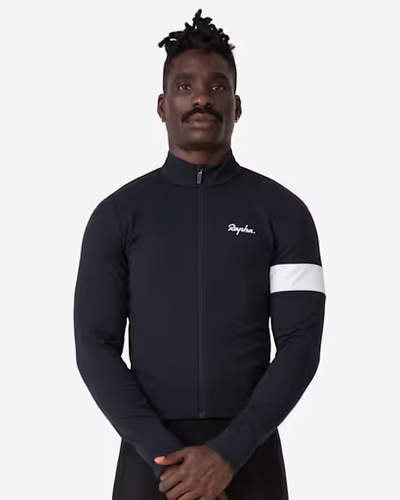 A man wearing a Rapha tight black cycling shirt