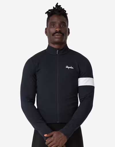 A man wearing a Rapha tight black cycling shirt