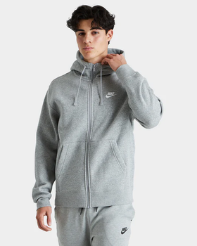 A man wearing a grey nike outfit from JD sports