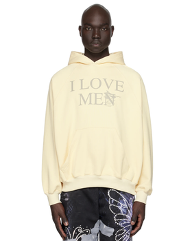 A man wearing a 'I Love Men' Praying hoodie and colorful butterfly pants