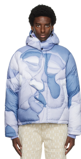 A man wearing a KidSuper baby blue puffy jacket