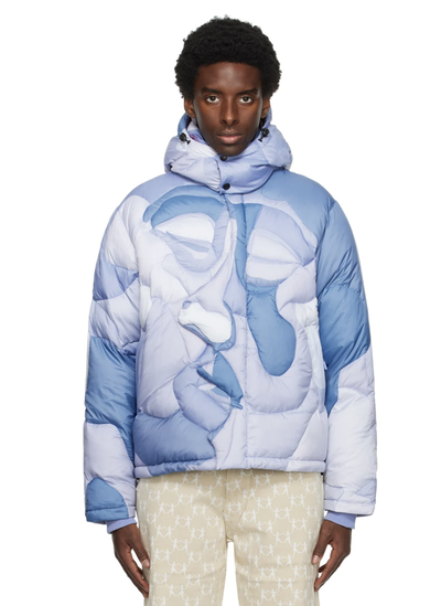 A man wearing a KidSuper baby blue puffy jacket