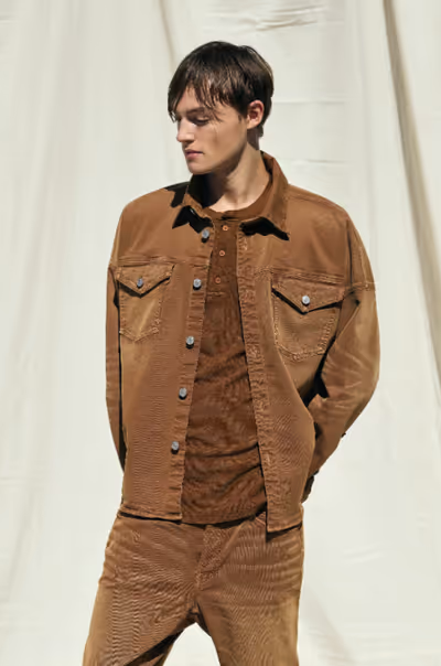 A man wearing an all brown outfit by Cotton Citizen