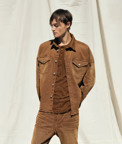 A man wearing an all brown outfit by Cotton Citizen