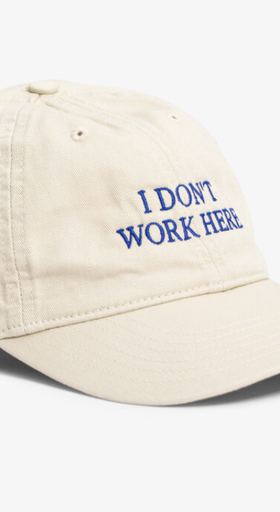 A close up of a beige Idea Hat