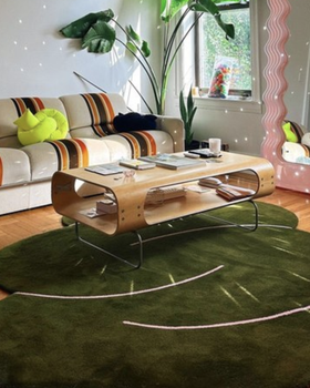 A blue Okej Rug in an apartment