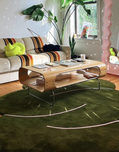 A blue Okej Rug in an apartment