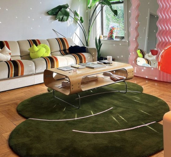 A blue Okej Rug in an apartment