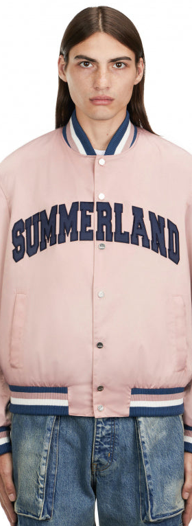 A man wearing a Nahmias Summerland jacket in pink