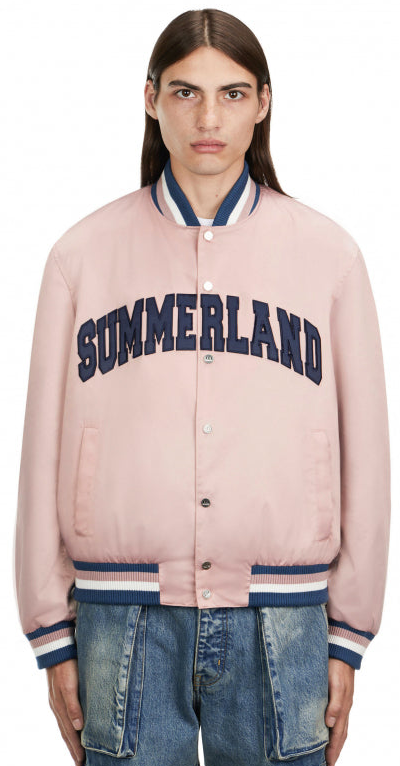 A man wearing a Nahmias Summerland jacket in pink