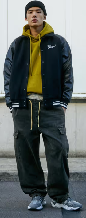 A man wearing a Pull & Bear sweatsuit and hoodie