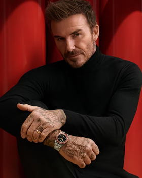 David Beckham wearing a Tudor watch and a black shirt