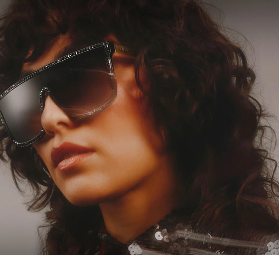 A woman wearing a pair of Quay Australia sunglasses