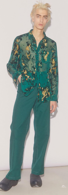 A man wearing a green Sies Marjan outfit