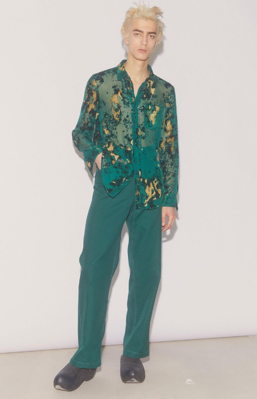 A man wearing a green Sies Marjan outfit