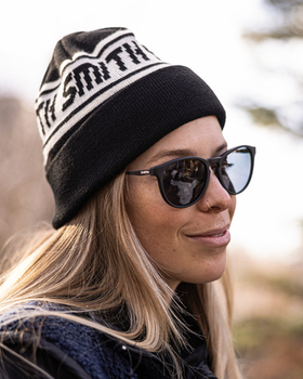A woman wearing a pair of Smith Optics sunglasses