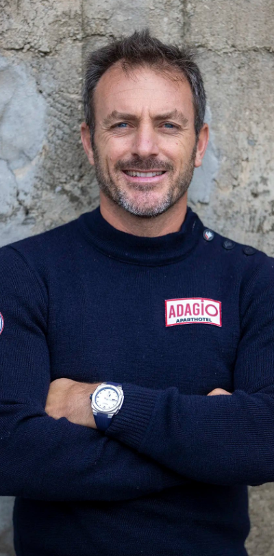 A man wearing an Alpina silver watch