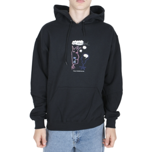 A man wearing a Frog Skateboards hoodie and blue jeans