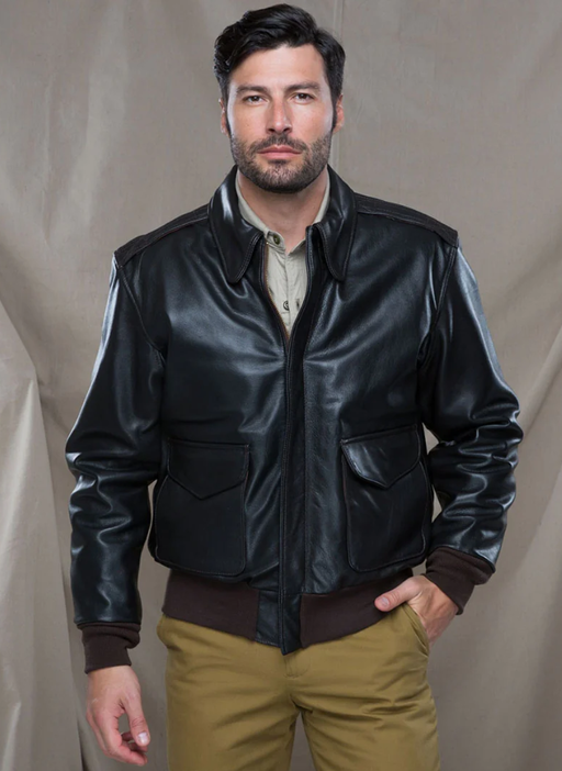 A man wearing a Cockpit USA military jacket and brown pants