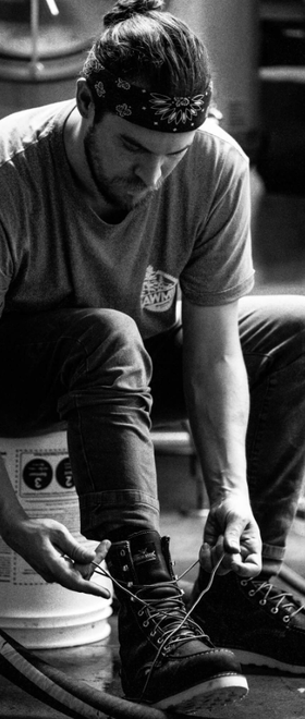 A man wearing a pair of Thorogood workwear boots