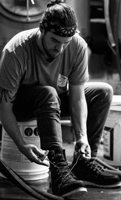 A man wearing a pair of Thorogood workwear boots