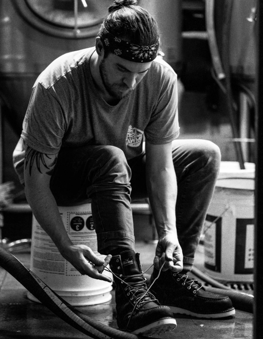 A man wearing a pair of Thorogood workwear boots