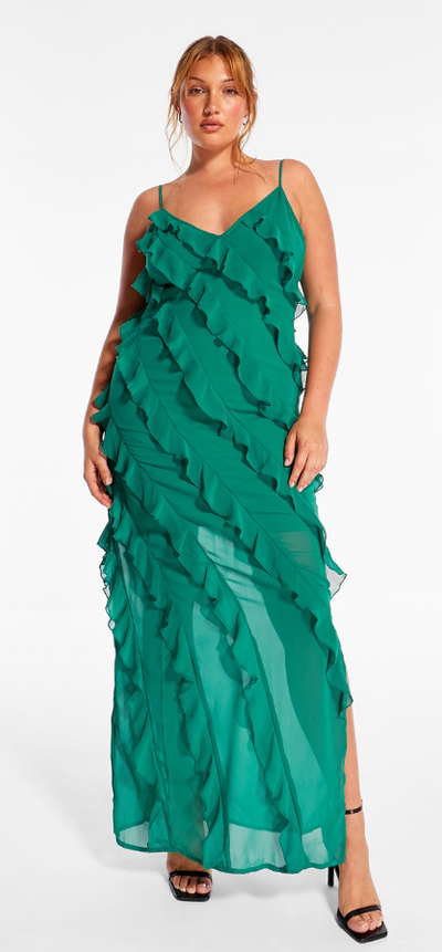 A woman wearing a green Missguided dress