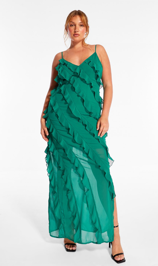 A woman wearing a green Missguided dress