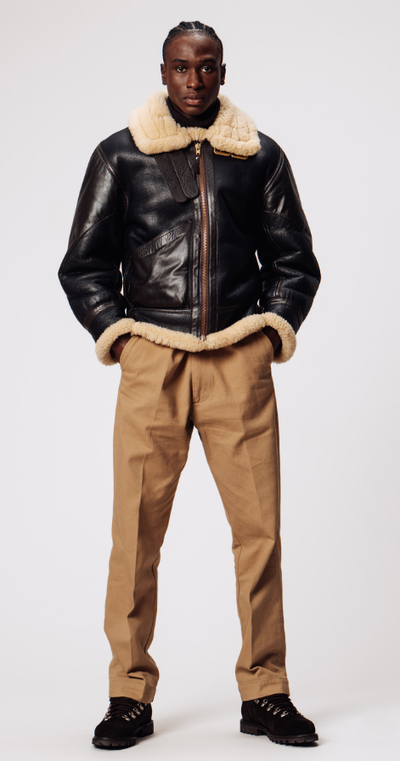 A man wearing a Morjas outfit with classic shoes