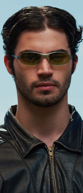 A man wearing a pair of BRU EYEWEAR sunglasses
