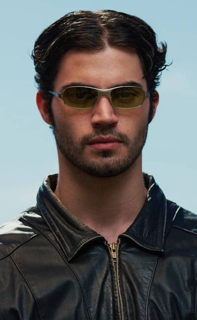 A man wearing a pair of BRU EYEWEAR sunglasses