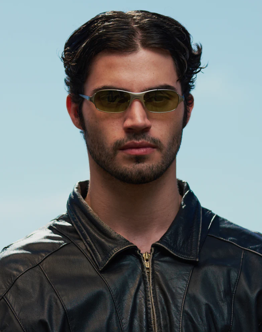 A man wearing a pair of BRU EYEWEAR sunglasses