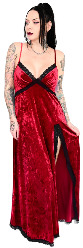 A woman wearing a gothic red FoxBlood Clothing dress