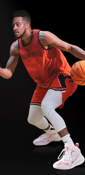 A man wearing a Li-Ning white professional basketball shoes
