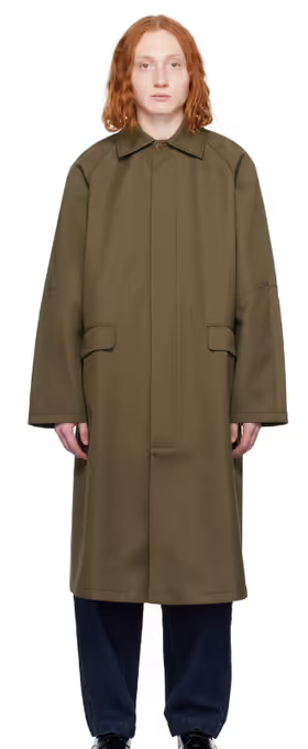 A man wearing a Cordera khaki long trench coat